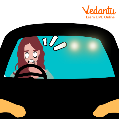A Woman Screaming at a Car Reflecting the High Beam