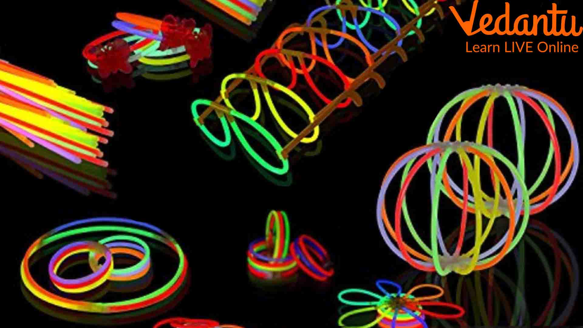 What are glow sticks, and what's the chemical reaction that makes them light  up?