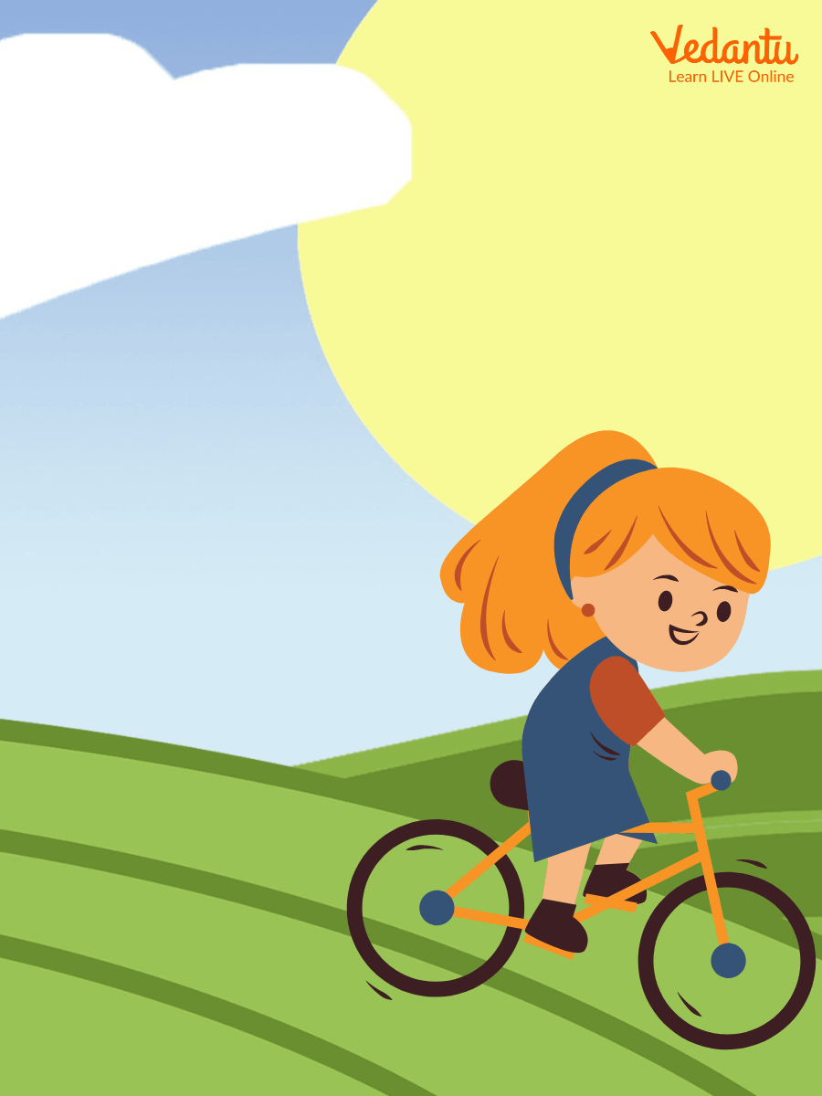 the little girl riding her bike across the valley